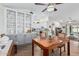 Open dining area with built-in hutch and kitchen view at 10606 E Hercules Dr, Sun Lakes, AZ 85248