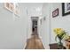 Light and bright hallway with wood flooring at 10606 E Hercules Dr, Sun Lakes, AZ 85248