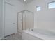 Bathroom with shower and bathtub at 10950 N 184Th Dr, Surprise, AZ 85388