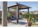 Patio furniture under pergola in backyard at 10950 N 184Th Dr, Surprise, AZ 85388