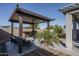 Pergola covered patio with seating area at 10950 N 184Th Dr, Surprise, AZ 85388