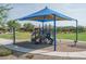 Community playground with shade structure and play equipment at 10950 N 184Th Dr, Surprise, AZ 85388