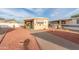 Well-maintained mobile home with landscaped yard and walkway at 11411 N 91St Ave # 131, Peoria, AZ 85345