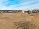 Aerial view of a house with a large backyard in a desert setting at 12093 W Blackhawk Rd, Casa Grande, AZ 85194