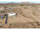 Aerial view showcasing a house's unique desert setting and expansive lot at 12093 W Blackhawk Rd, Casa Grande, AZ 85194