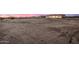 Large desert lot behind recently built home at 12093 W Blackhawk Rd, Casa Grande, AZ 85194