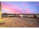 View of backyard fire pit and patio area at 12093 W Blackhawk Rd, Casa Grande, AZ 85194