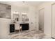 Modern bathroom with double vanity at 12093 W Blackhawk Rd, Casa Grande, AZ 85194