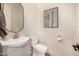 Modern bathroom with gray vanity and gold fixtures at 12093 W Blackhawk Rd, Casa Grande, AZ 85194