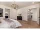 Main bedroom with wood floors and walk-in closet at 12093 W Blackhawk Rd, Casa Grande, AZ 85194