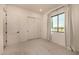 Spacious bedroom with window and closet at 12093 W Blackhawk Rd, Casa Grande, AZ 85194