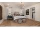 Main bedroom with fireplace and ensuite bathroom at 12093 W Blackhawk Rd, Casa Grande, AZ 85194