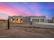 Stunning desert contemporary home with two-car garage and beautiful sunset views at 12093 W Blackhawk Rd, Casa Grande, AZ 85194