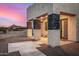 Covered porch with modern chairs and mountain views at 12093 W Blackhawk Rd, Casa Grande, AZ 85194