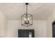 Modern geometric light fixture in entryway at 12093 W Blackhawk Rd, Casa Grande, AZ 85194