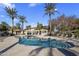 Community pool with surrounding lounge chairs at 1351 N Pleasant Dr # 1118, Chandler, AZ 85225