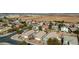 Aerial view of a suburban neighborhood with homes and desert landscape at 1358 E Jardin Dr, Casa Grande, AZ 85122