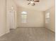 Bright bedroom with neutral walls and carpeted floors at 1358 E Jardin Dr, Casa Grande, AZ 85122