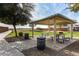 Covered picnic area with tables and benches at 1358 E Jardin Dr, Casa Grande, AZ 85122