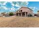 Large backyard featuring a swimming pool and a two-story house at 1503 N Quail Ln, Gilbert, AZ 85233