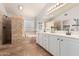 Elegant bathroom with a soaking tub, double vanity, and walk-in shower at 1503 N Quail Ln, Gilbert, AZ 85233