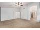 Large bedroom with neutral decor and access to a full bathroom at 1503 N Quail Ln, Gilbert, AZ 85233