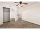 Bedroom with mirrored closet and access to bathroom at 1503 N Quail Ln, Gilbert, AZ 85233