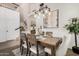 Elegant dining room with a loft view at 1503 N Quail Ln, Gilbert, AZ 85233