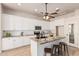 Modern kitchen with white cabinets and granite countertops at 1503 N Quail Ln, Gilbert, AZ 85233