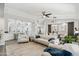 Open concept living space with white sofas and kitchen views at 15045 W Mulberry Dr, Goodyear, AZ 85395