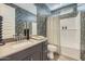 Modern bathroom with patterned wallpaper, white subway tile shower, and freestanding bathtub at 1505 W J Waltz Way, Apache Junction, AZ 85120