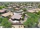 Aerial view of a single-story home with a large backyard in a quiet neighborhood at 15338 W Montecito Ave, Goodyear, AZ 85395