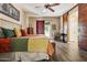 Main bedroom with sliding barn doors and a king-size bed at 15338 W Montecito Ave, Goodyear, AZ 85395