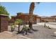 Single-story home with stucco and stone exterior, two-car garage, and desert landscaping at 15338 W Montecito Ave, Goodyear, AZ 85395