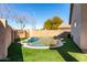 Relaxing kidney shaped pool in sunny backyard at 15548 N 156Th Ln, Surprise, AZ 85374