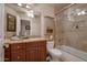 Bathroom boasts granite countertops and a glass shower at 16005 S 10Th Pl, Phoenix, AZ 85048