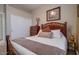 Well-lit bedroom with a double bed and spacious closet at 16005 S 10Th Pl, Phoenix, AZ 85048