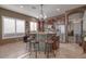 Kitchen with island, stainless steel appliances, and dark wood cabinetry at 16005 S 10Th Pl, Phoenix, AZ 85048