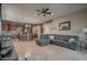 Open kitchen with island, ample counter space, and views to the living room at 16005 S 10Th Pl, Phoenix, AZ 85048