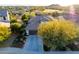 Beautiful aerial view of a single-Gathering home with desert landscaping, a driveway, and a well-maintained tile roof at 17833 W Verdin Rd, Goodyear, AZ 85338