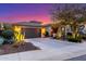 Stunning home exterior featuring desert landscaping, a well-manicured lawn, and inviting curb appeal at 17833 W Verdin Rd, Goodyear, AZ 85338