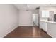 Bright dining room features hardwood floors and a modern chandelier at 18212 N 136Th Ave, Sun City West, AZ 85375