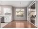 Dining area with hardwood floors and sliding glass doors at 18212 N 136Th Ave, Sun City West, AZ 85375