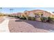 View of multiple houses with a walkway and desert landscaping at 18212 N 136Th Ave, Sun City West, AZ 85375