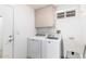 Laundry room with washer, dryer, and sink at 18212 N 136Th Ave, Sun City West, AZ 85375