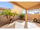 Spacious patio with shade cover at 18212 N 136Th Ave, Sun City West, AZ 85375