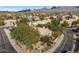 Aerial view of single-story house with desert landscaping and mountain views at 19275 N 88Th Way, Scottsdale, AZ 85255