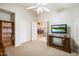 Bright bedroom with a view into the dining room and ample closet space at 19275 N 88Th Way, Scottsdale, AZ 85255