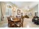 Bright dining room with hardwood floors and a large table at 19275 N 88Th Way, Scottsdale, AZ 85255