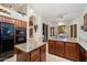 Kitchen boasts granite island and stainless steel appliances at 19275 N 88Th Way, Scottsdale, AZ 85255